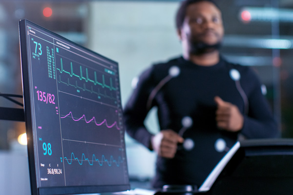 Person hooked up to a machine to measure exercise levels