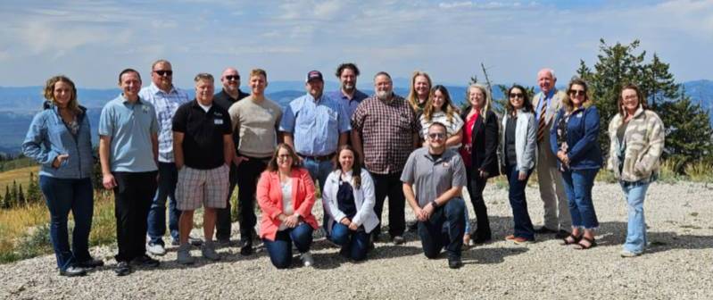 Central Utah Leaders group on the mountain top looking over the valley below