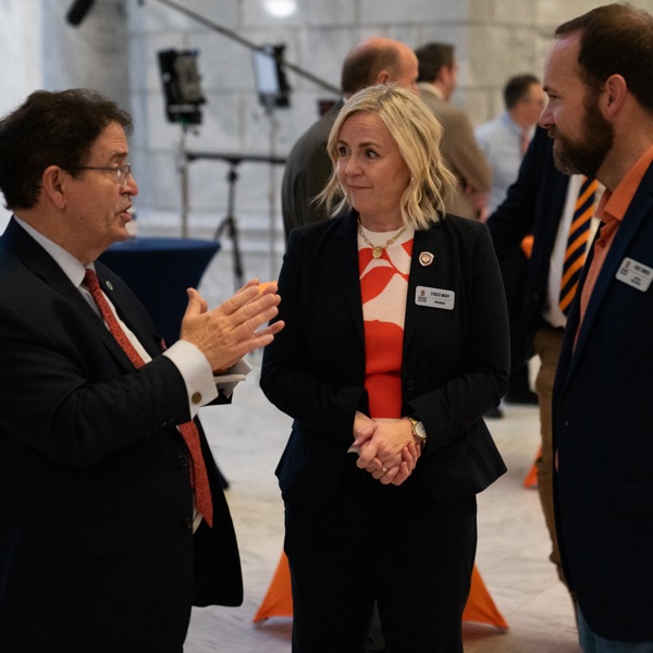 Snow College President Stacee McIff and GRIT Center Director Russ Tanner visit with Utah legislators