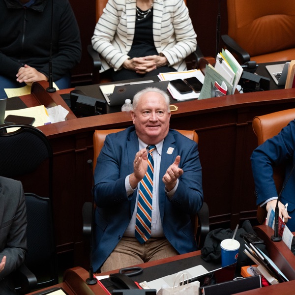 Representative Steven Lund applauds Snow College students, staff, and faculty on the floor of the House