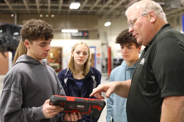 Youth learning about automotive technology at Snow College