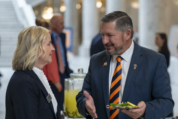 President McIff talking with Senator Darren Owens